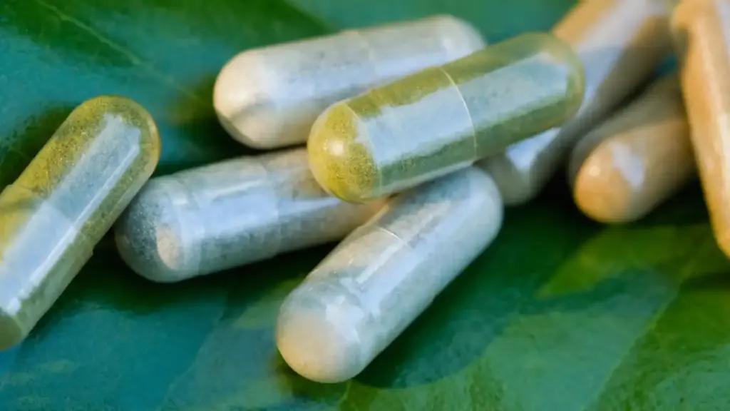 supplements placed on the green leaf