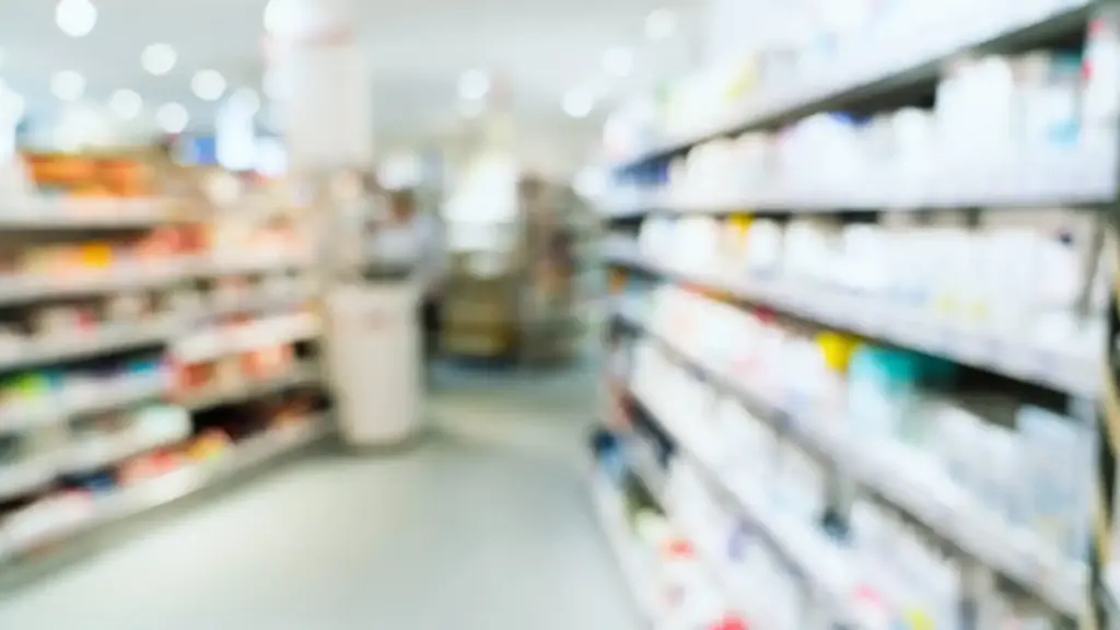 long aisle of medicine in pharmacy