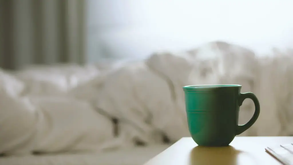 cup of hot tea by the bed