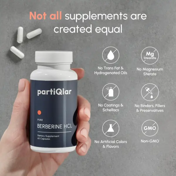 berberine supplements bottle in hand