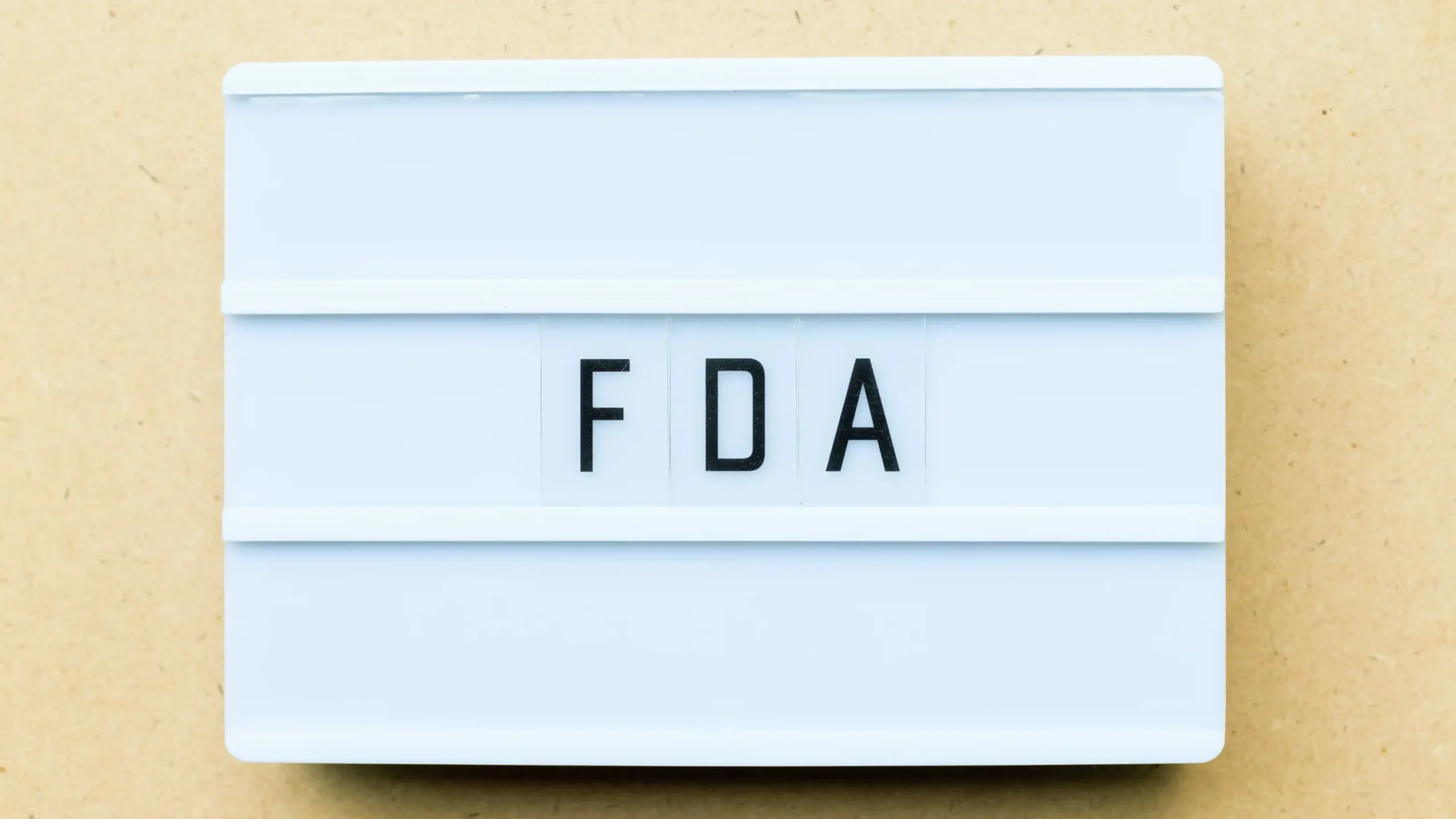 white box with letters spelled FDA