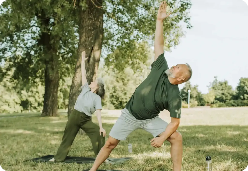 partiqlar - Elderly people doing yoga in a park